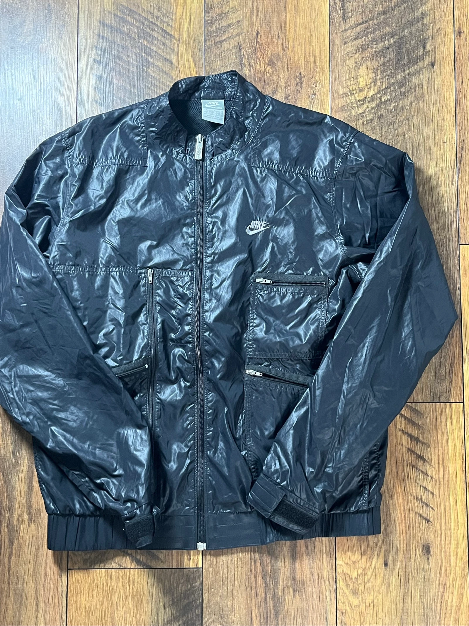 Veste coupe-vent Sportswear multi-poches zippées - Nike - taille S - très bon état